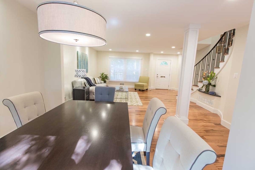 After photo of remodeled open space in dining and living room in Reston, VA