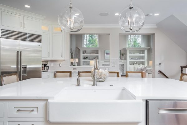 kitchen with white and stainless steel accents