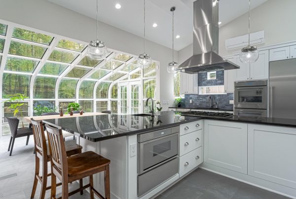 kitchen with large windows and stainless appliances