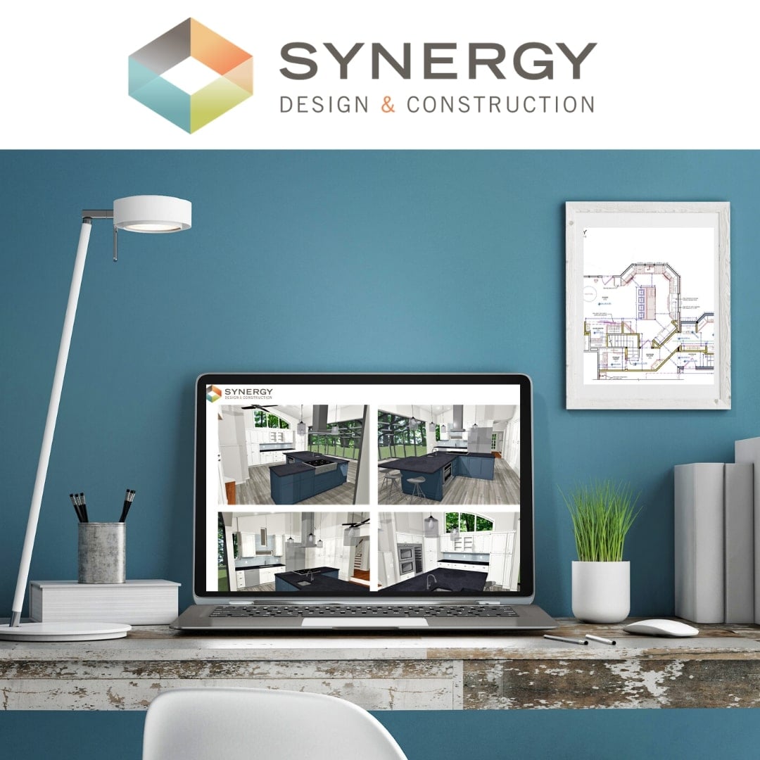 Synergy logo with computer at desk