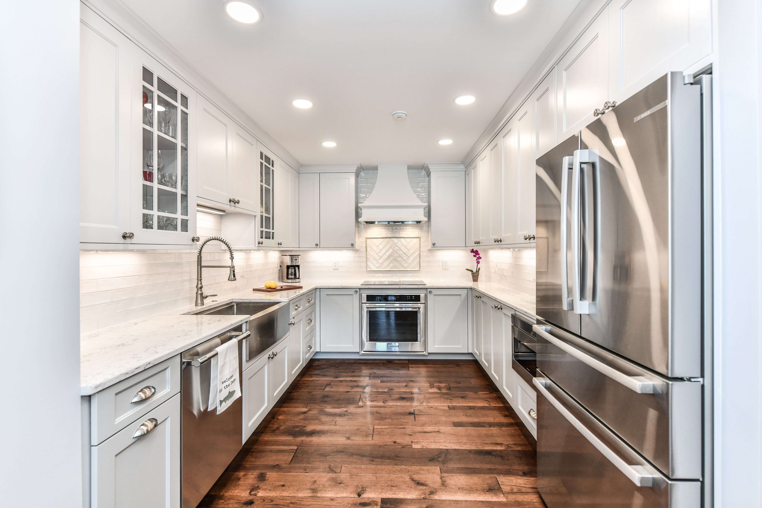 kitchen with stainless and white accents after remodel