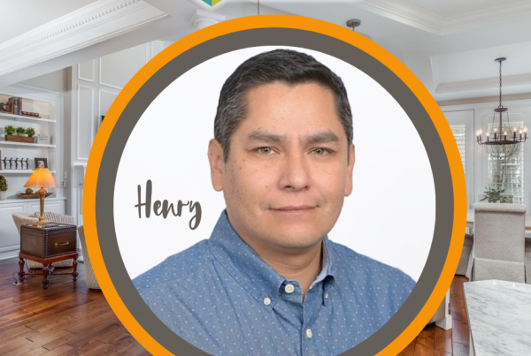 close up portrait of Henry with Synergy logo